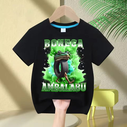 Black t-shirt with a graphic design featuring a green character and text, hanging against a neutral background.